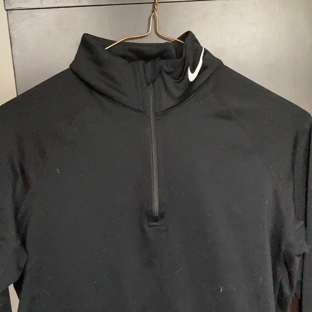 Solid black women’s athletic jacket. Nike pro. Size medium.